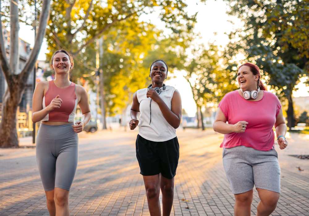 Friends going for a run in the park nearby Seapointe Villas in Costa Mesa, California