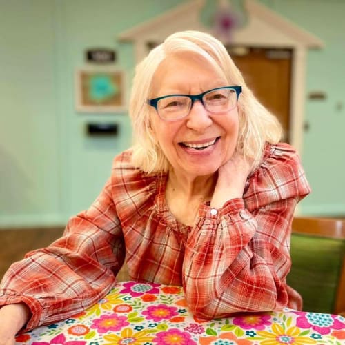 A happy resident of Oxford Glen Memory Care at Sachse in Sachse, Texas