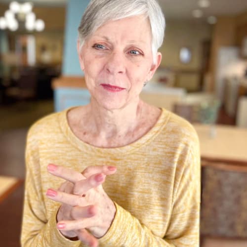 A resident at Oxford Glen Memory Care at Sachse in Sachse, Texas