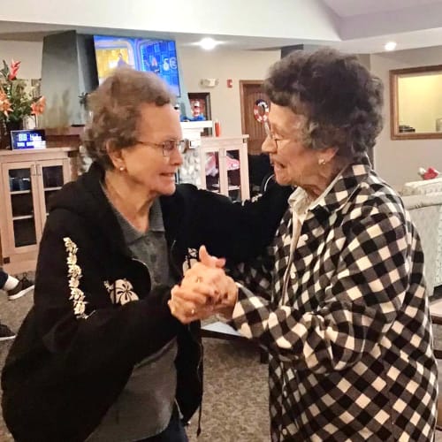 Residents dancing at Glen Carr House Memory Care in Derby, Kansas