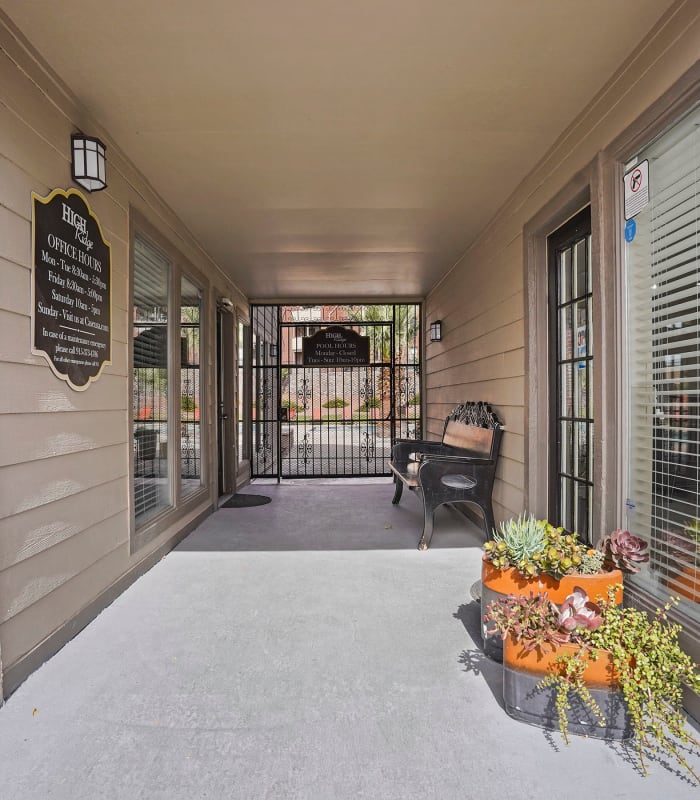 Entry area with flowers at High Ridge Apartments in El Paso, Texas