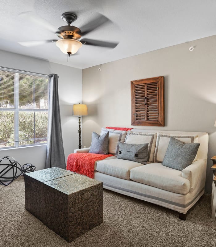 Carpeted living room at The Patriot Apartments in El Paso, Texas