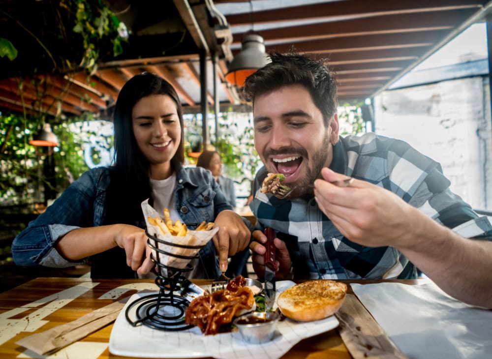 A happy couple having meal at restaurant near Dashiell Mews in Indian Head, Maryland