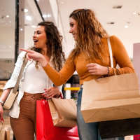 Resident friends shopping in the mall near The Simone in Silver Spring, Maryland