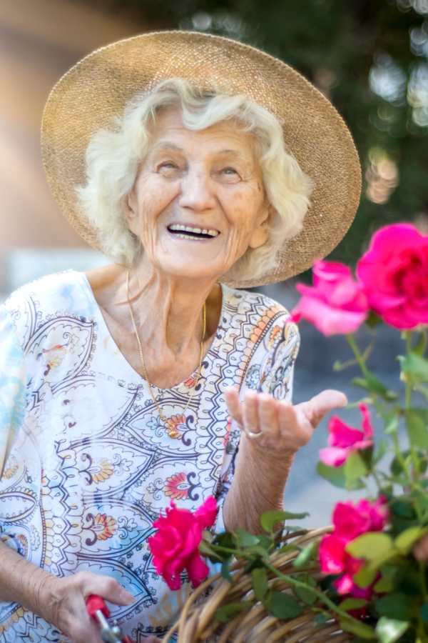 Resident gardening at Merrill Gardens at Rolling Hills Estates in Rolling Hills Estates, California