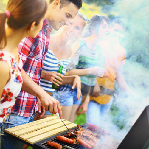 Residents barbequing food during a community event at Silver Strand I in Coronado, California