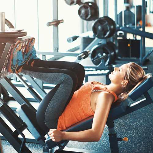 Resident relaxing on a flotation device in the pool at Stadium Loft Apartments in Saint Louis, Missouri