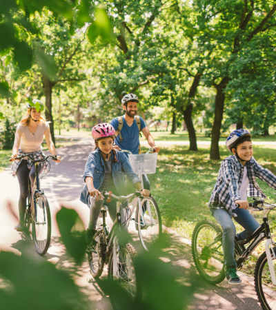 Resident family riding bicycles near Brixin Sonora in Fort Wayne, Indiana