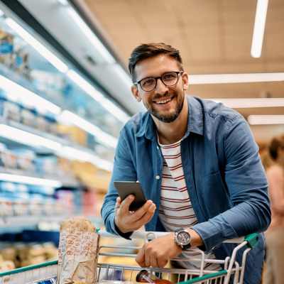 A resident shopping in a grocery store near The Verandahs, Montgomery Village, Maryland