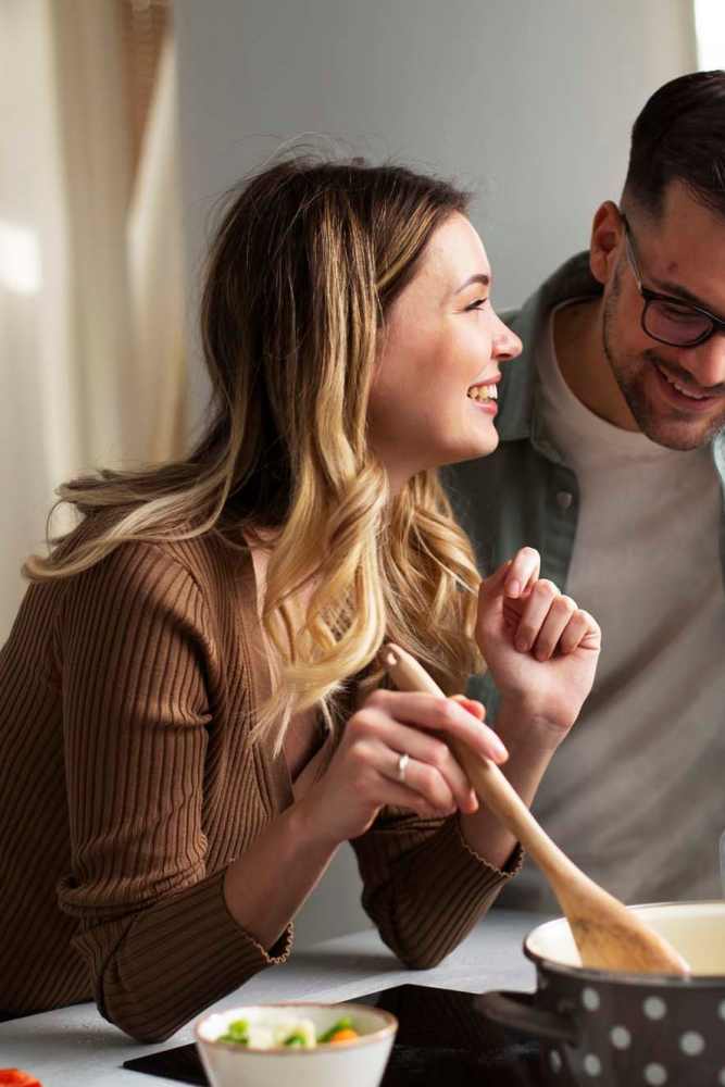 Couple in a kitchen at Crescent Apartments in Roseville, California