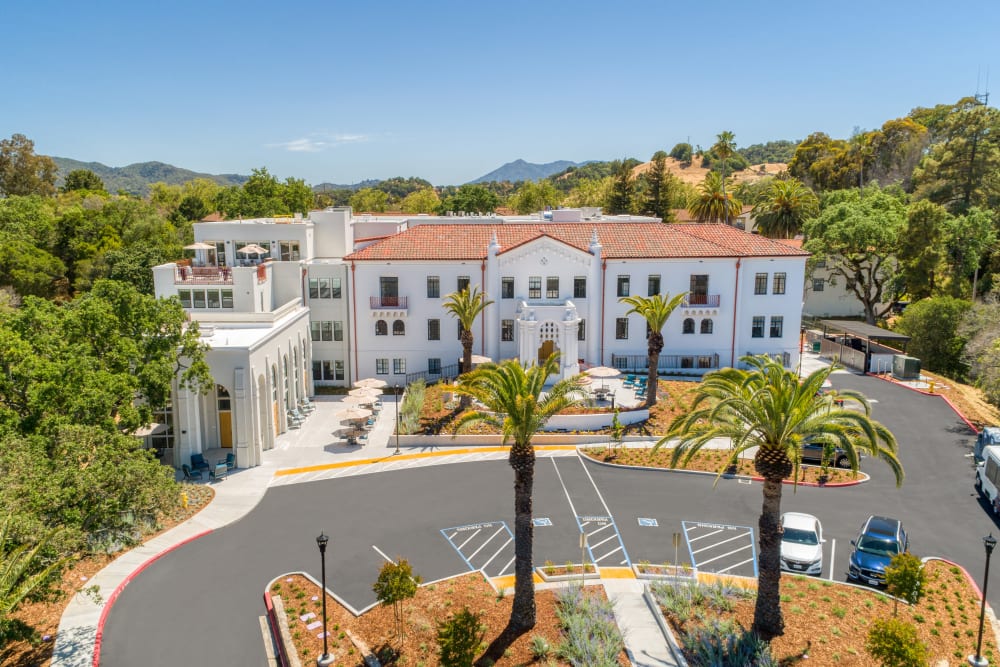 Aerial view of exterior of building and parking lot at The Bluffs at Hamilton Hill in Novato, 