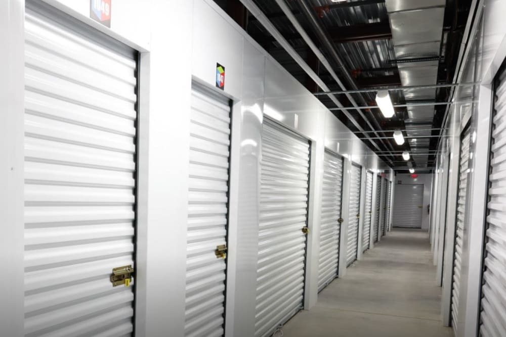 A row of indoor storage units at Avid Storage in Miramar Beach, Florida