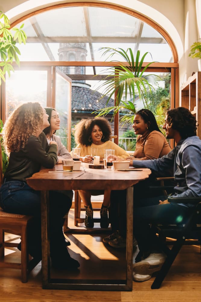 Residents and friends catching up at a favorite local eatery near Lumberton Apartment Homes in Lumberton, New Jersey
