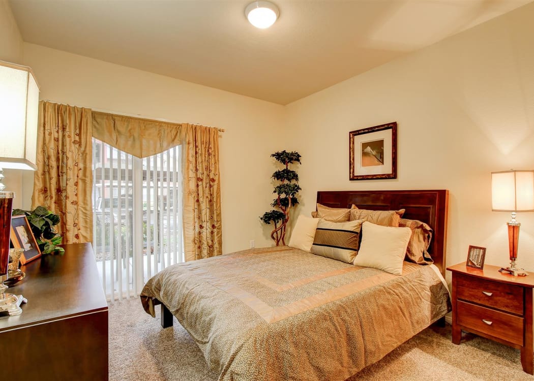 Well-decorated master bedroom at Brooks Landing in Modesto, CA