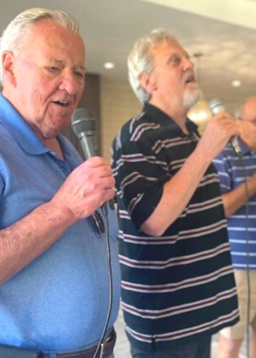 Residents singing karaoke at Sunstone Village in Denton, Texas.