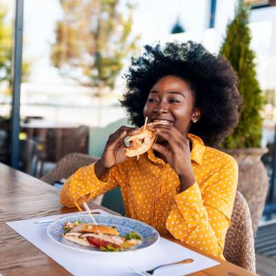 Residents enjoying a meal at restaurant near The Madison in Charlotte, North Carolina