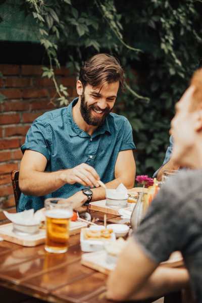 Resident enjoying food and drinks at Sand Pebble and Spanish Oaks in Sparks, Nevada