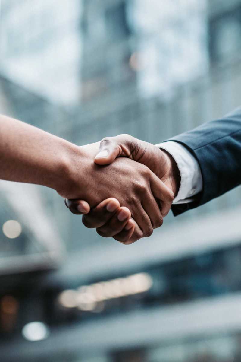 Residents holding hands at Affordable Housing and Services Collaborative in Braintree, Massachusetts