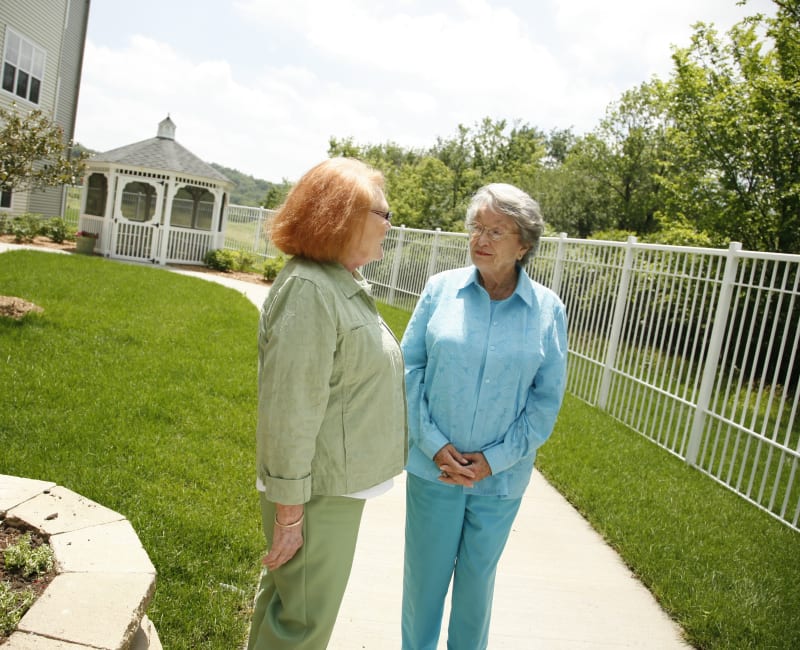 Residents by the gazebo at Deer Crest Senior Living in Red Wing, Minnesota