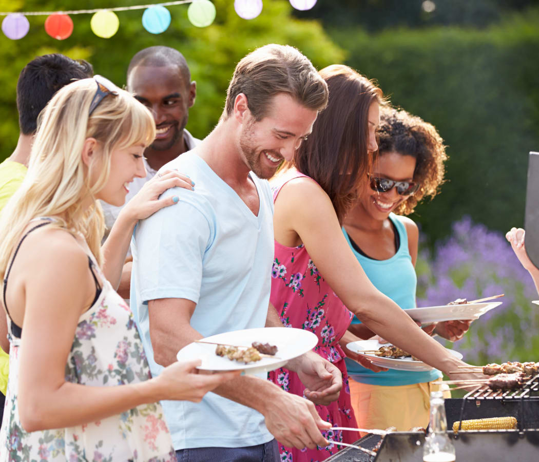 Friends barbecuing at Audubon Park in Nashville, Tennessee