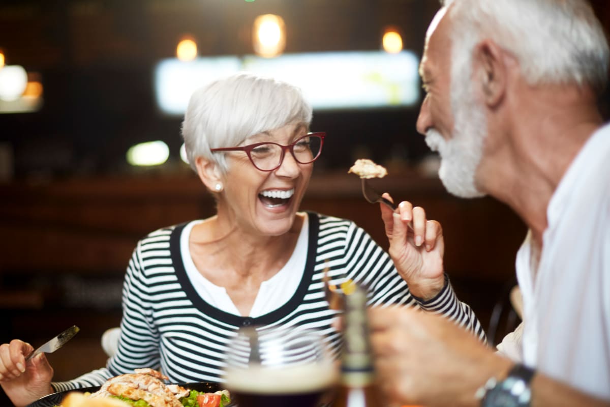 Couple having a fun dining experience together