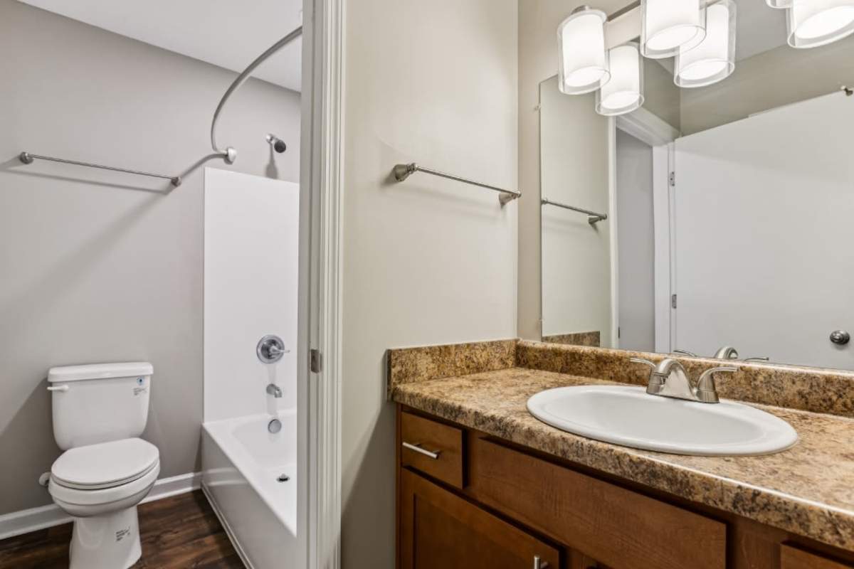 Resident bathroom with lots of counter space at Ashford Place in Clarksville, Tennessee