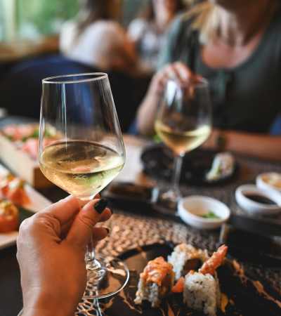 Resident eating lunch at a favorite restaurant near Isles at East Millenia in Orlando, Florida