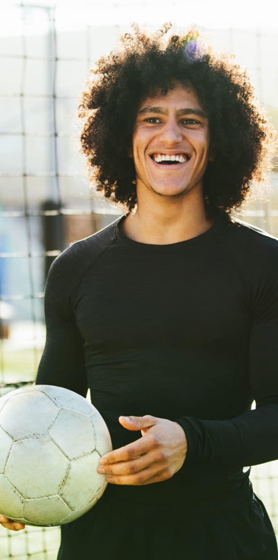 Student playing soccer near Hawks Pointe in Lawrence, Kansas