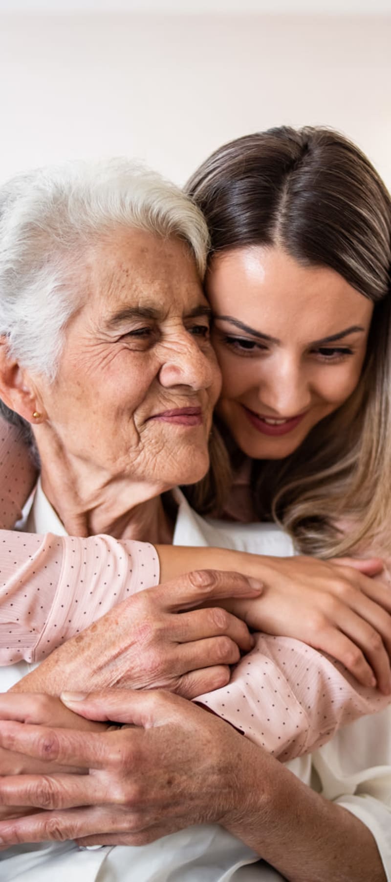 Resident and family member embracing at Transitions At Home - Central in Stevens Point, Wisconsin