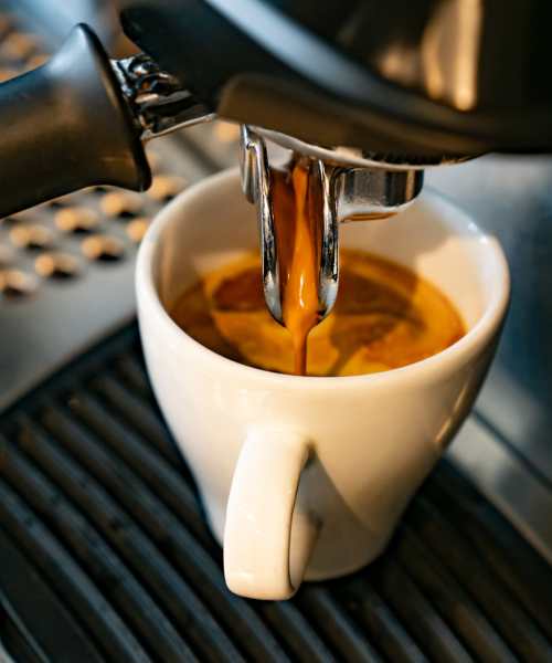 A cup of coffee on a table at a cafe near Anderson Greene I in Cedar Rapids, Iowa