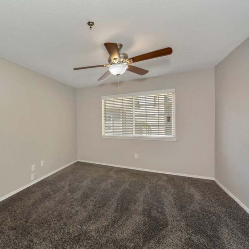 Unfurnishedbedroom with carpet flooring at Lake Hefner Townhomes in Oklahoma City, Oklahoma