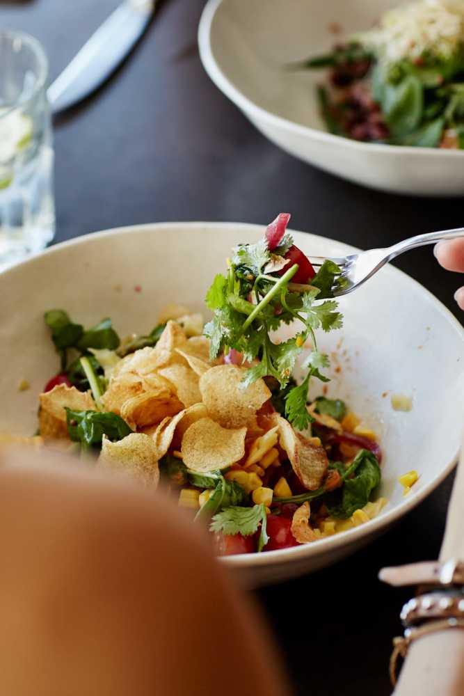 Resident having salad at a restaurant near Filbin Creek in North Charleston, South Carolina