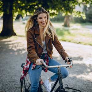Resident biking near The Courtyards Pacific Village in San Diego, California
