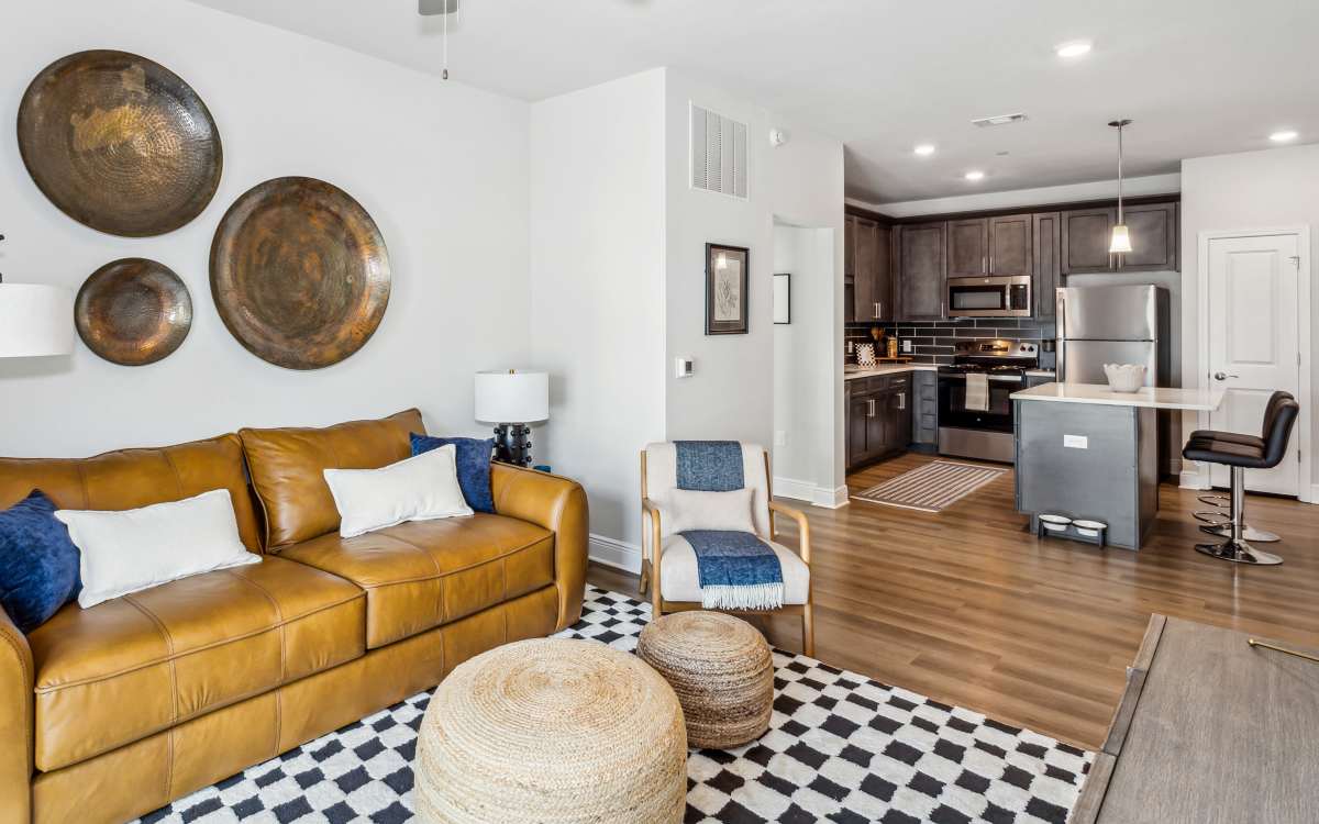 Open concept living room and kitchen at City North in Pensacola, Florida
