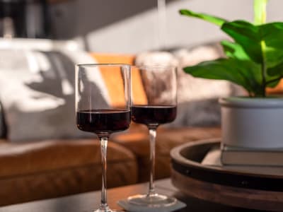 Glasses of wine on the coffee table at City Walk Apartments in Concord, California