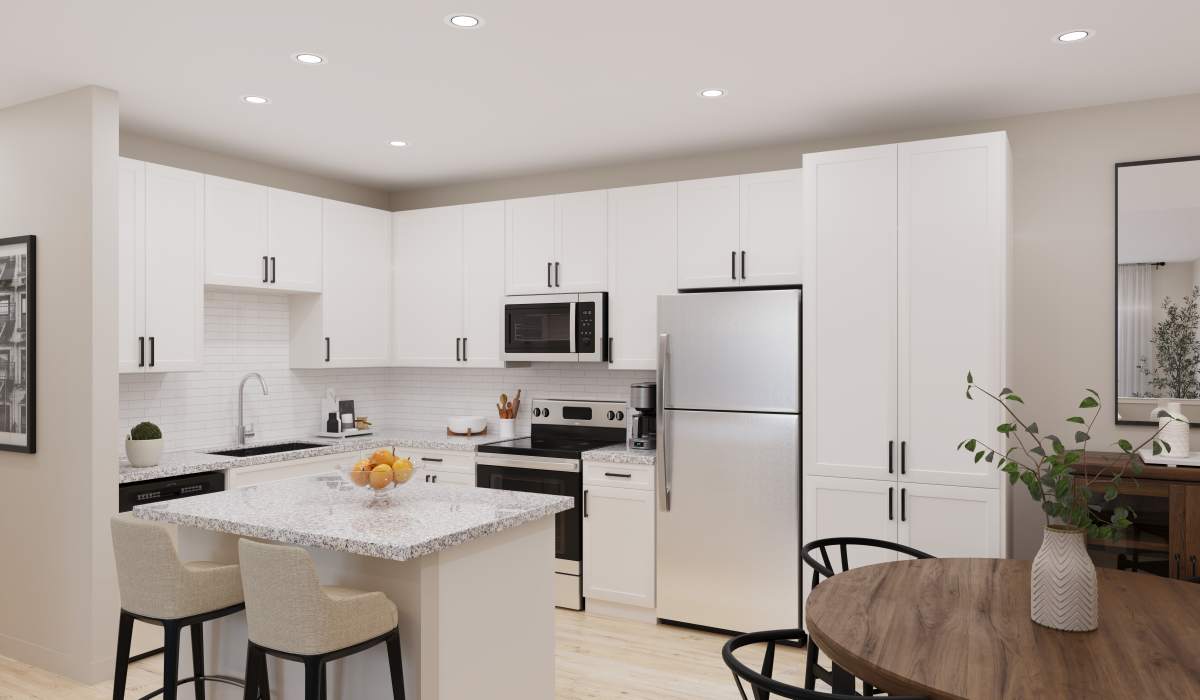 Hepburn floor plan living room and kitchen with white cabinets at Remington Lake Apartments in Hamilton, Ohio