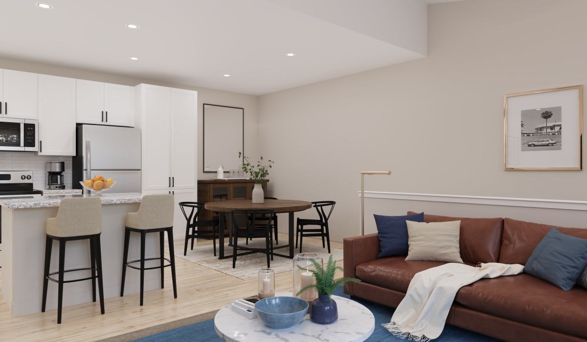 Hepburn floor plan living room and kitchen with white cabinets at Remington Lake Apartments in Hamilton, Ohio