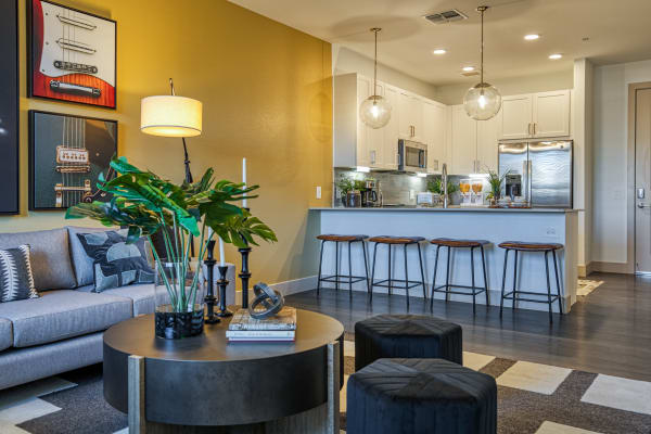 Modern living room and kitchen at Alexan Tempe in Tempe, Arizona 