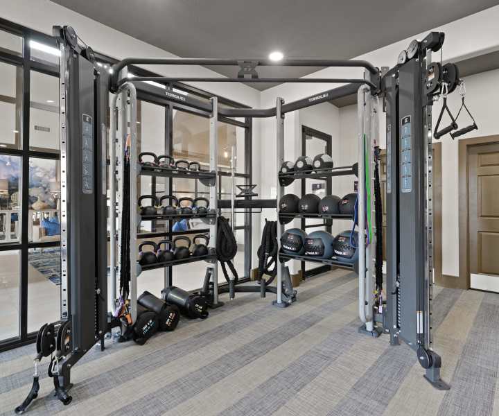 Fitness center with various equipment at Florence in Houston, Texas