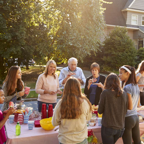 Residents gathering during a community event at Wellings Court in Virginia Beach, Virginia