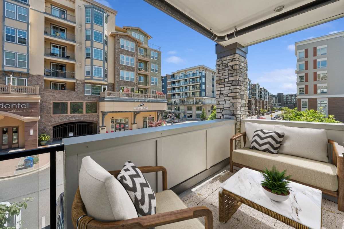 Private balcony with neighborhood views at Village on Main in Tacoma, Washington