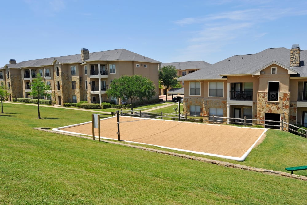 Volleyball Court at El Lago Apartments in McKinney, Texas