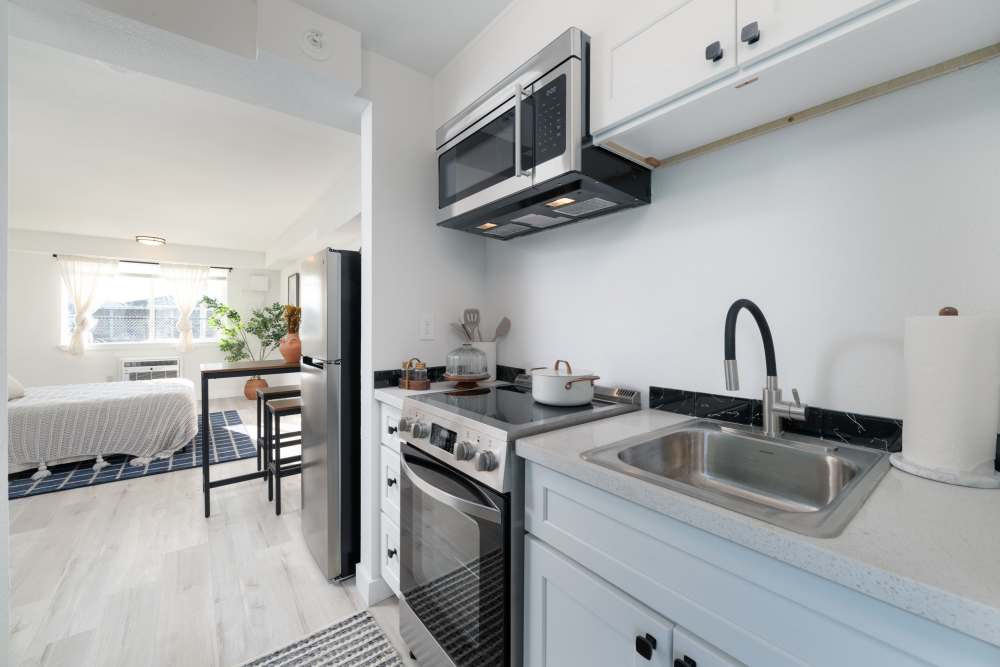 Modern Kitchen with stainless appliances at Pinnacle Point Apartments in Fife, Washington