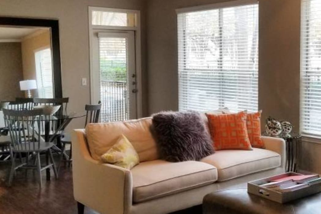 Naturally well-lit living room at Ridgecrest Apartment Homes in Austin, Texas