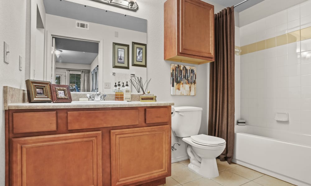 Spacious and clean model bathroom at Villas of Waterford Apartments in Wichita, Kansas