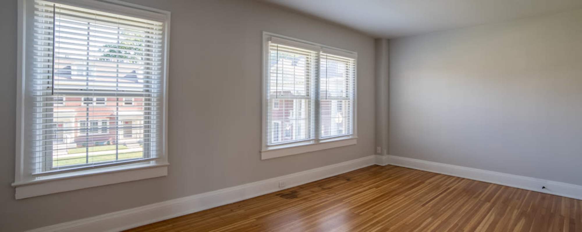 Living room with wood floors at  Buckingham and Balmoral in Indianapolis, Indiana