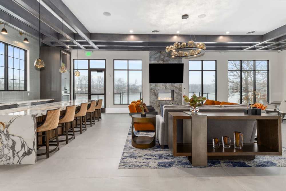 Resident community spaces with  ample natural light at Encore at West Valley in White Lake, Michigan