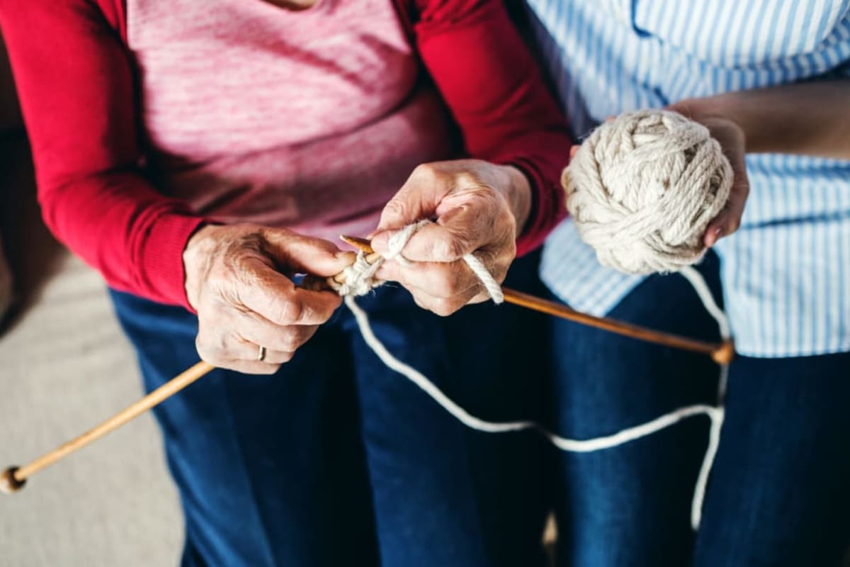 Two residents knitting at Oxford Springs Tulsa Assisted Living in Tulsa, Oklahoma
