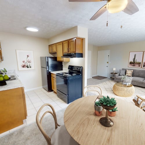 Dining Room, Kitchen, and Living Room in an apartment at Northgate Meadows Apartments in Cincinnati, Ohio