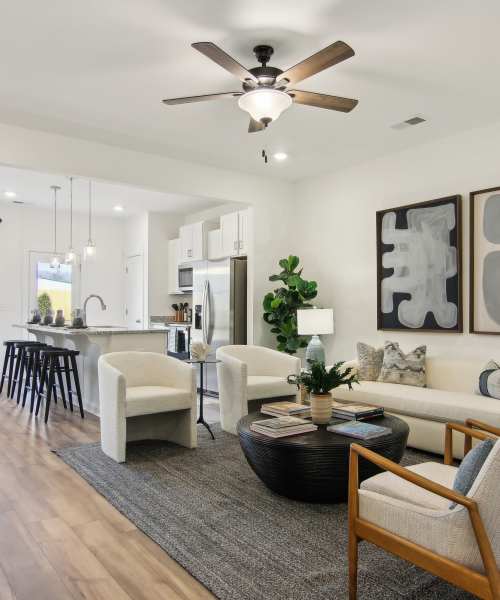 Open concept living room and kitchen at Artisan Living Mills River in Mills River, North Carolina